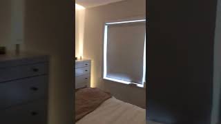 LED strip lighting behind headboard and in alcoves