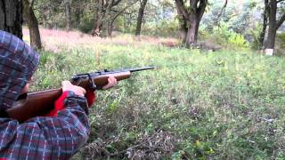 Garret shooting a 22 caliber rifle - Marlin model 25