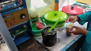 STREET FOOD ICE CENDOL DURIAN  ( KING Fruit )small, doughy rice-flour droplets used in cold drinks.