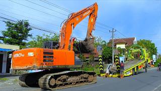 10 Wheeler Truck Transporting Hitachi Excavator Back To The Construction Depot