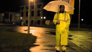 Wearing a Yellow raincoat in the rain