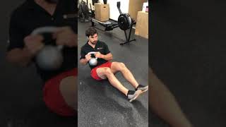 Kettlebell Russian Twists feet elevated