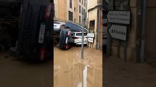 Flash floods in Spain: Muddy torrents sweeping away cars as huge storms hit.