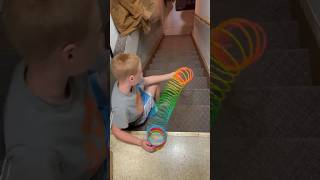 Everyone loves a slinky!! Jamison with some old school fun 🤩 #fun #old #slinky #play