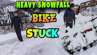 "Winter Adventures: Akpa Village Bike Stuck in Heavy Snowfall!"