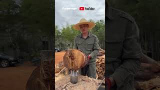 Young man chopping wood