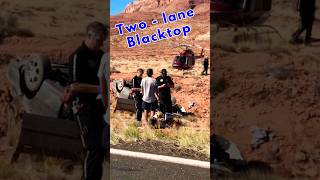 Two-lane blacktop, a reminder to pay attention while driving