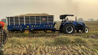 Poori raat maarda New Holland with Loaded tralla.