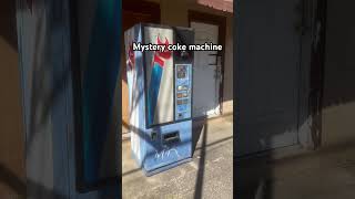 A mysterious Coke machine in the hood