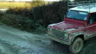 Land Rover 110 at Devils Pit - Slippery hill decent