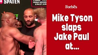 Mike Tyson slaps Jake Paul at weigh in for their heavyweight boxing match