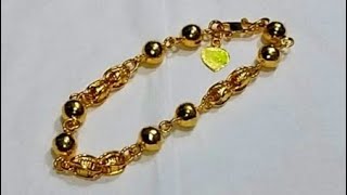 gelang emas 24k.model bola - bola.berat 12,5 gram.ukuran 17 cm,,,