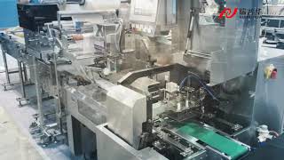 Bakery flow packaging machine with anstaling agent feeder, bread machine, cake machinery