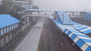 Big Daddy - Double Decker train passing from lower Parel Station in heavy rains