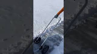 Effortless Snow and Grain Shoveling with a Wheeled Snow Pusher