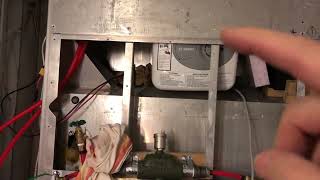 Connecting the radiant heating pump and heater tour for off grid shipping container