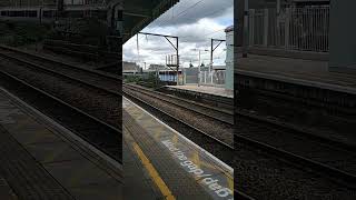 Class 345 departing & class 720 passing Romford