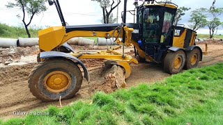 CATERPILLAR 140M super motor grader working spreading soil for repair Road with dump track ,Roller