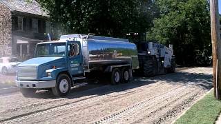 Water truck and Wirtgen reclaimer