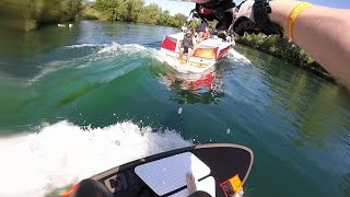 Wakesurfing behind the Nautique G21