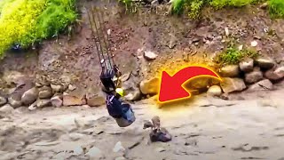 Construction worker climbs into crane bucket and swings out over river to help lost dog