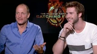 Liam Hemsworth & Woody Harrelson joke about Jennifer Lawrence's Diva Antics