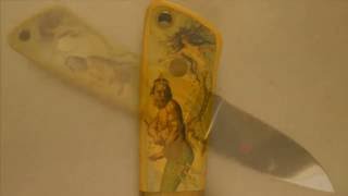 Scrimshaw Showing by Adams - Mermaid and Neptune on Knives