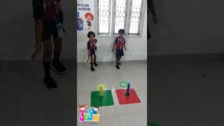 "Ring toss fun! 🎯  #KidsActivities #TossAndPlay #FunAndLearn"