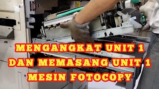 Melepas unit 1 mesin fotocopy dan memasang unit 1 mesin fotocopy