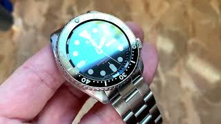 Seiko SKX007 Disc Date Black, Insert Ceramic, Cristal Glass Sapphire AR Blue.