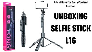 UNBOXING THE BEST SELFIE STICK TRIPOD L16 FOR VLOGGING /ALL IN ONE TRIPOD/ JUMIA