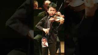 a child plays classical music violin WoOoow