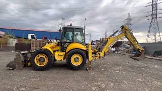 Экскаватор-погрузчик New Holland B115, 2007год