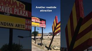 Another roadside attraction: Hand painted sign and plywood arrows in Gallup, New Mexico.