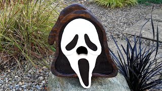 Scream Mask bird nesting box on fencing wood...