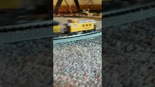 Running the life like Union Pacific emd gp60 with a Bachmann caboose in n scale. 10/10/24