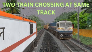 TWO TRAIN CROSSING AT SAME TRACK