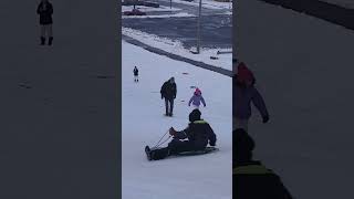 Lexi walking strong up Slippery sled hill.