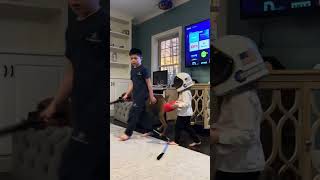 Brother and sister sword fight and box each other