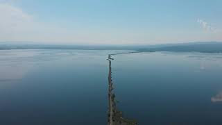 Aerial drone view of sea landscape with road