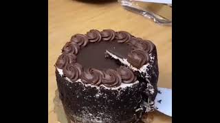 layered of dark chocolate cake with dark chocolate cream