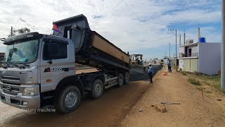 Excellent Techniques operator bulldozer push gravel Mix with dump truck unloading Gravel