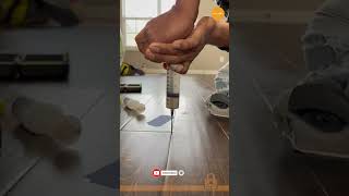 How to fix hollow sounding tiles injecting or grouting of resinous Epoxy Material