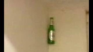 Sticking a beer and vodka bottle to the wall.