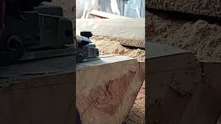 cleaning wood with electric planer.