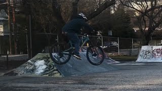 Mountain biking at a skate park