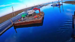 Dredging the Barney bay.  Dock road #fyp #fpv #new