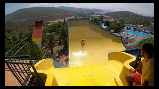 single U water slide at adaland aqua park pov 4k