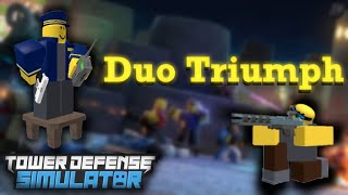 Duo Triumphing with a friend in Tower Defense Simulator