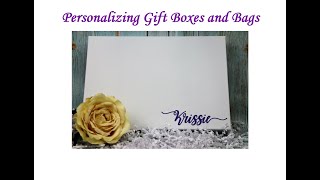 Applying vinyl decals to gift boxes and bags